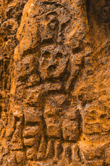 Rock texture hieroglyphs Taino art carved in the wall of the cave in Cueva del indio arecibo