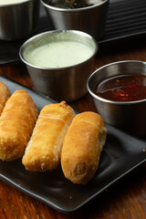 traditional venezuelan appetizer tequeño, stuffed with cheese