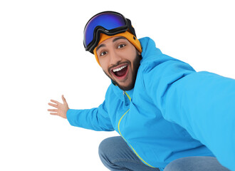 Smiling young man with ski goggles taking selfie on white background
