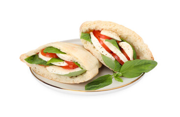 Plate of delicious pita sandwiches with mozzarella, tomatoes and basil isolated on white