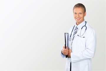 Portrait of handsome young doctor posing