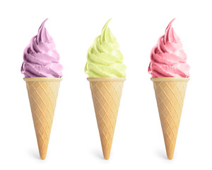 Set of different delicious soft serve ice creams in crispy cones on white background