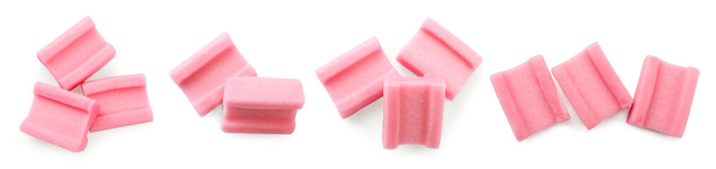 Set of tasty pink bubble gums on white background, top view