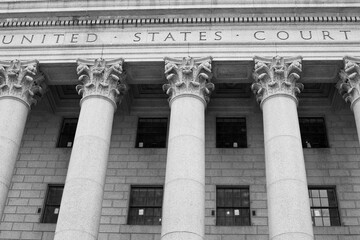 Facade of courthouse with columns.