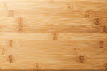 Naklejka premium Empty cutting board on top of a table. appetizer board. Board concept. Appetizer concept.
