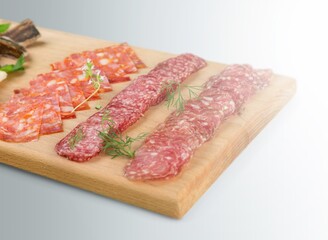 Appetizers table with set of different snacks and cheese.