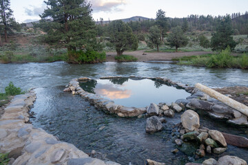 Reflection on the Hot Spring Pools Along the East Fork of the Carson River in California
