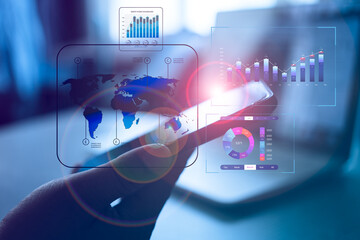 Hand holding smartphone with predictive business KPI data technology dashboard. Dashboard with financial analytics graphs