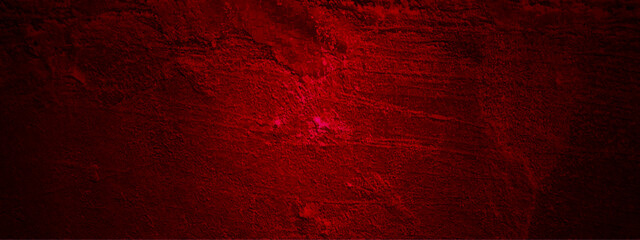 Dark red splattered grungy backdrop. Grunge texture of a dilapidated wall in a red tone