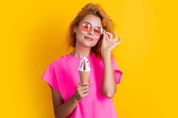 happy summer woman with cone icecream in studio. summer woman with cone icecream