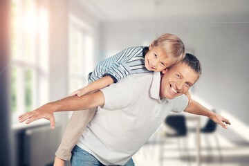 Fototapeta premium Happy young family with cute child