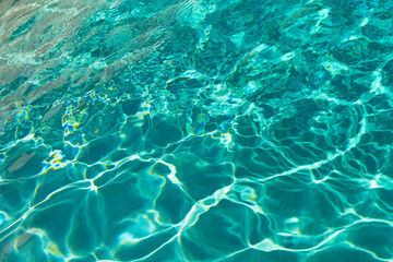 image of defocused turquoise water background. defocused turquoise water background