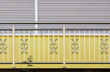 fence. chrome stainless steel fence on balcony
