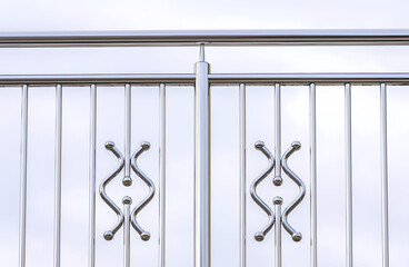 fence. chrome stainless steel fence on balcony
