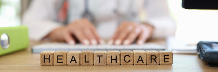 Healthcare word collected with wooden cubes in row