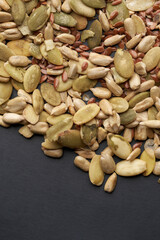 Cereal Mix of flax seeds, sesame, sunflower and pumpkin seeds close up