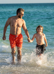 dad and son child has special moments at sea. Father son adventures. dad man and son kid running in sea beach. Father son bonding enjoying summer vacation. having fun