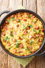Dibbelabbes is an oven baked potato leek hash, prepared from grated raw potatoes, bacon and leeks...