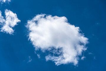 Obraz premium white stratocumulus clouds at blue sky in summer