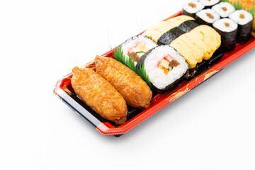 Fototapeta na wymiar 白背景の助六寿司