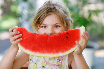 Little Girl, Preschooler, Delights in a Juicy Watermelon on a Sunny Summer Day. Child sharing a Healthy Snack with Her Family, She Embraces the Joy of Summertime Bliss