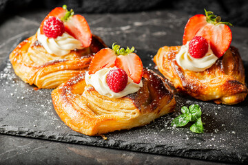 Delicious flaky fresh baked Danish Pastry with Chantilly cream and fresh fruit.