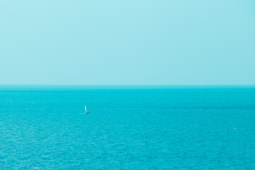 Single or alone sailboat in the big sea.