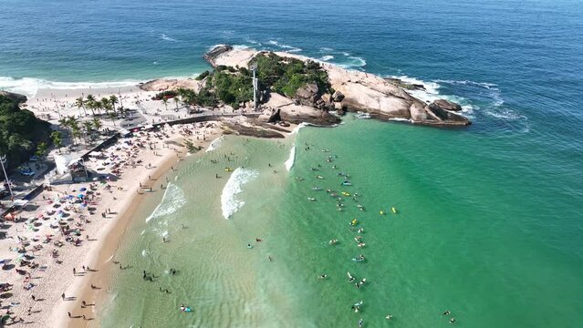 Aerial view of Diabo beach and Ipanema beach, Pedra do Arpoador. People sunbathing and playing on the beach, sea sports. Rio de Janeiro. Brazil