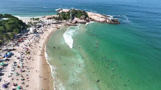 Aerial view of Diabo beach and Ipanema beach, Pedra do Arpoador. People sunbathing and playing on the beach, sea sports. Rio de Janeiro. Brazil