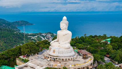 Beautiful Phuket white Big Buddha statue on blue sky background. Aerial view of Big Buddha...