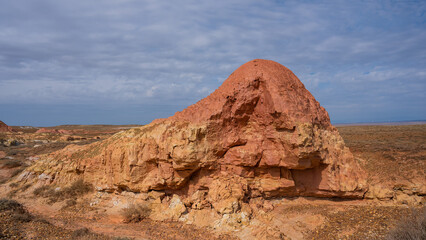 Landscape of multi-colored clay dunes. Mars on earth.