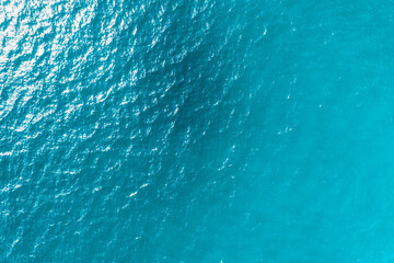 blue ocean waves background. Water surface on ocean. copy space area for text. Reflection on the surface of the ocean on a calm day.