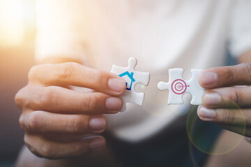 Puzzle with goal, achievement and house icons Real estate concepts, home business investments
