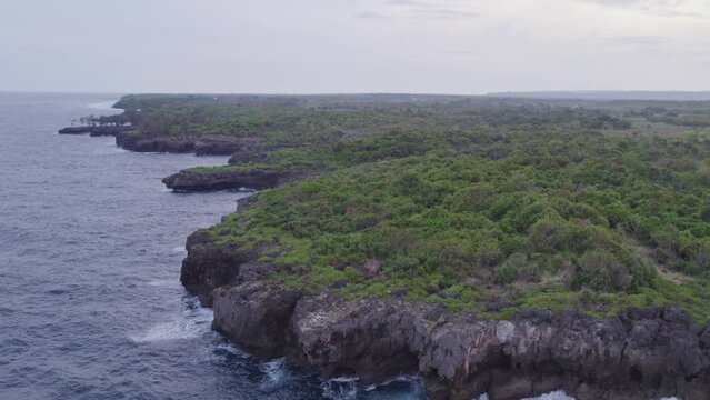 Wide shot of small cliff at Sumba island Indonesia. aerial