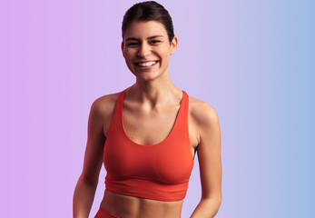 Fototapeta na wymiar Fit smiling woman in sportswear during sport training
