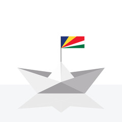 Origami paper ship with reflection and Seychelles flag.