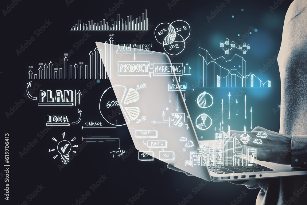 Poster Close up of hacker hands holding and using laptop with creative toned business sketch on dark background. Business strategy and finance concept.