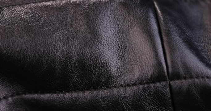 black - painted leather , details and part of the jacket made of artificial leather in black
