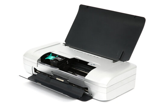 Printer for printing documents using a cartridge with an open lid for changing the cartridge. Isolated printer on a white background