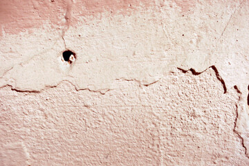 Pink rough painted wall of the house pink city wallpaper