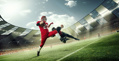 Dynamic image of competitive sportsmen, american football players in uniform, in motion during game at 3D stadium with ball. Concept of professional sport, competition, match, action, energy, success