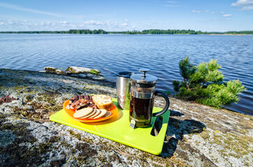 Outdoor coffee in summer lake scenery