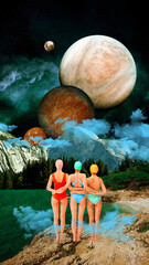 Young girls in swimming suits standing by the lake on cliff over giant planets in starry sky....