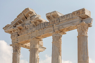 Temple of Apollo in Side (Turkey). Marble entablature of the ruined temple. Stone-cut masks relief on the frieze. History, art or architecture concept