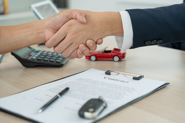 lease, rental car, sell, buy. Dealership shake hand customer for new Car. Sales, loan credit...