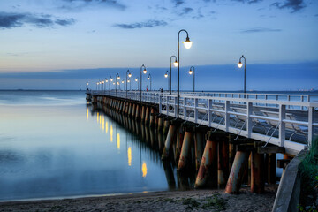 Obraz premium Sunrise at the Baltic Sea in Gdynia Orlowo, Poland