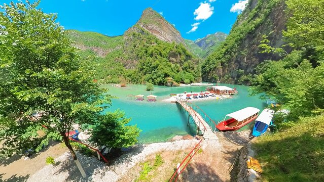 the Shala River, such highlight is Komani Lake, a picturesque reservoir nestled amidst stunning mountain scenery. This serene lake adds to allure of the area and provides peaceful spot for relaxation.