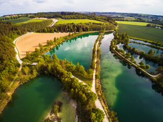 Drone point of view of fishing ponds near Allershausen in Upper Bavaria - District of Freising (Germany) - July 20, 2019