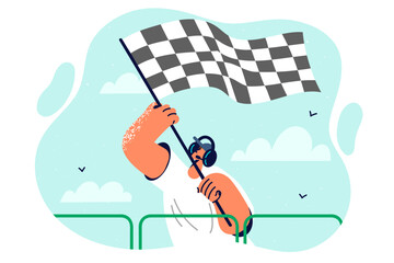 Starting flag in hands of man announcing start of race and giving signal to drivers high-speed cars