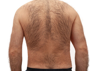 Hairy back of a young man isolated on white background. - 619738435